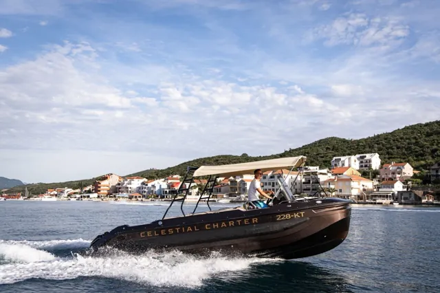 Private speedboat cruising Boka Bay in Montenegro