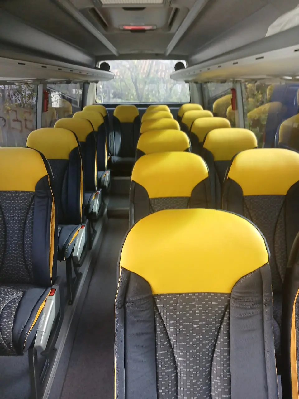 Comfortable passenger seating inside a group transport vehicle