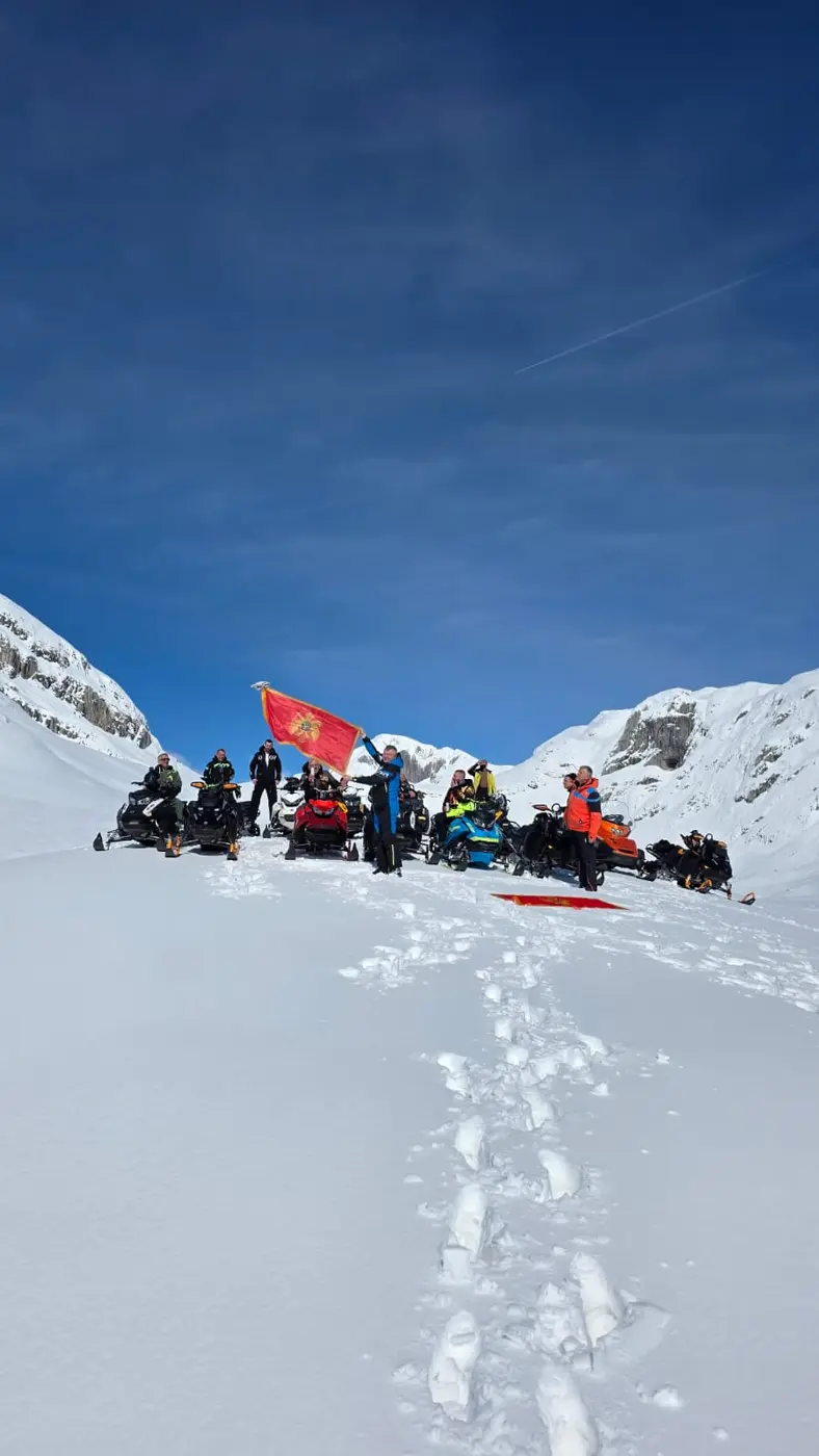 Snowmobile group gathered high in the snowy Durmitor mountains