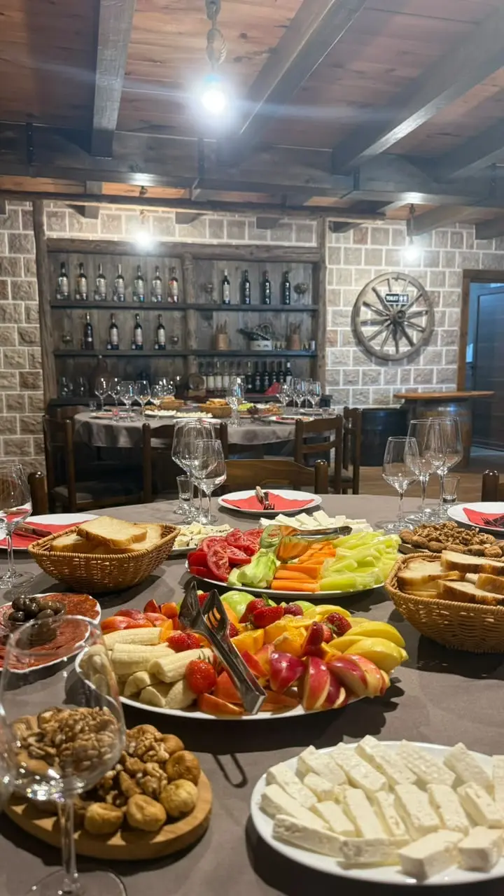 Homemade cheeses, fruit, bread and vegetables